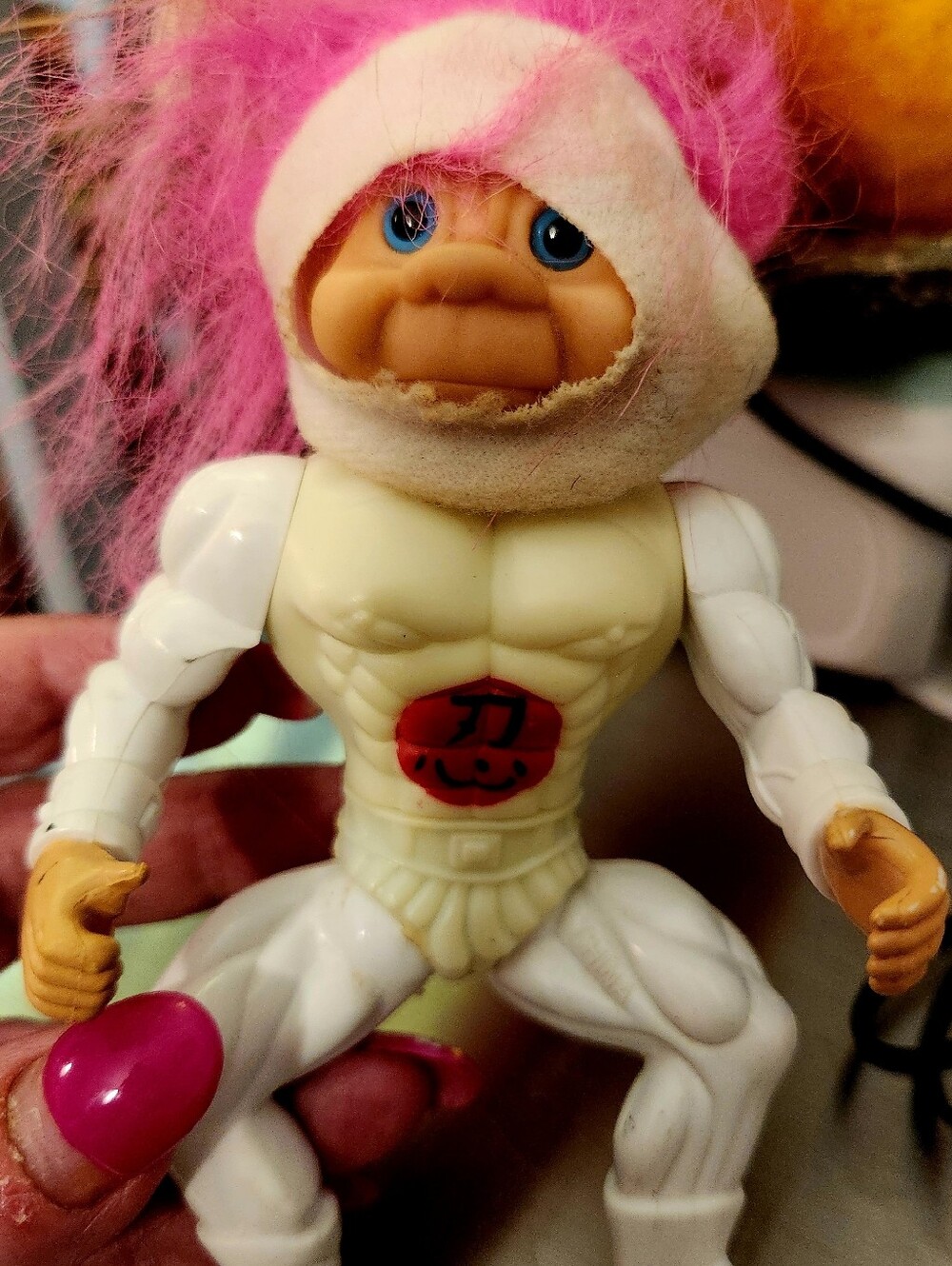 The VTG 1992 TNT Battle Troll Warrior Ninja Troll with a white body is an action